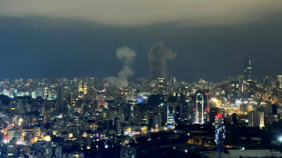 Israel strikes central Beirut, killing 18 