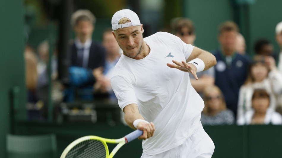 Struff beißt sich gegen Zhang durch