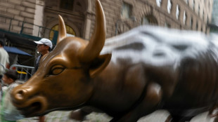 Stocks waver as investors weigh inflation data