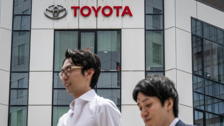 Toyota maintains net profit forecast despite drop in first half