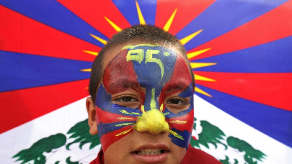 Tibetanos exilados se manifestam no 65° aniversário de seu levante fracassado