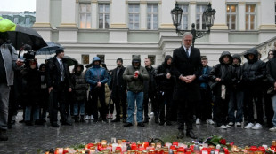 Police seek motive in Prague mass shooting