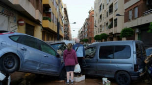 Spain urges hard-hit regions to stay home during flood rescue