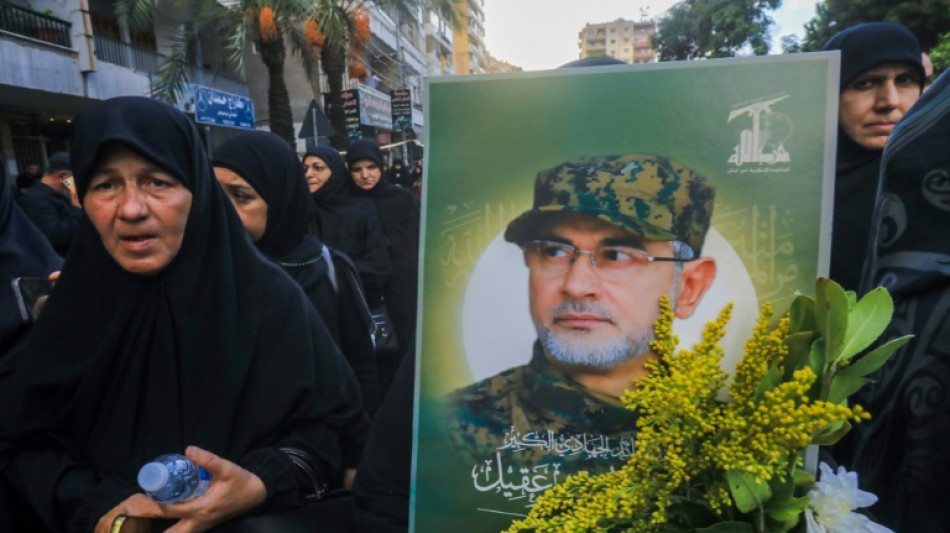 Mourners at commander's funeral express loyalty to Hezbollah 