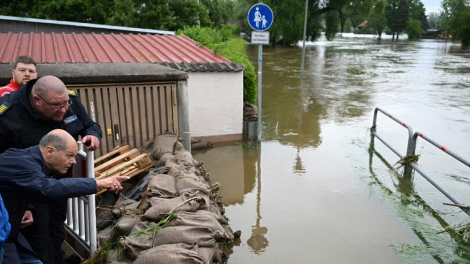 Thousands evacuated from German flood zone as Scholz visits