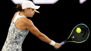 Barty powers into clash with giant-killer Anisimova