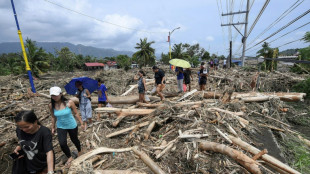 Tropical storm leaves towns submerged, 76 dead in Philippines